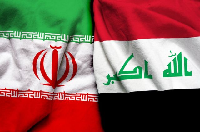 Флаги Ирана (слева) и Ирака.