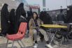 «Без названия». Женщина в Тегеране, игнорирующая закон об обязательном ношении хиджаба. 